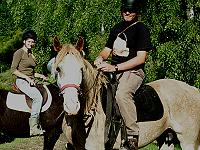 Jens is first time on a gaited curly. Nancy in the background.